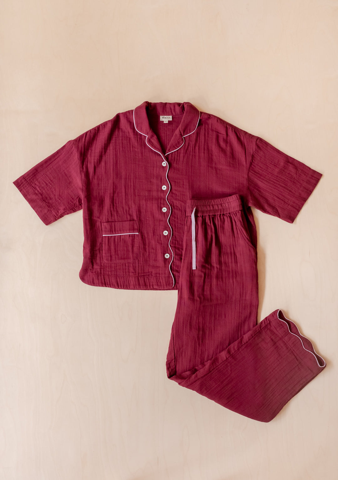 TBCo Cotton Pyjamas in Burgundy featuring piped trim, button-front shirt and matching trousers in crinkle gauze fabric