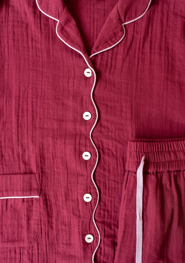 TBCo Cotton Pyjamas in Burgundy with white piping detail, scalloped button placket and patch pocket on textured gauze fabric